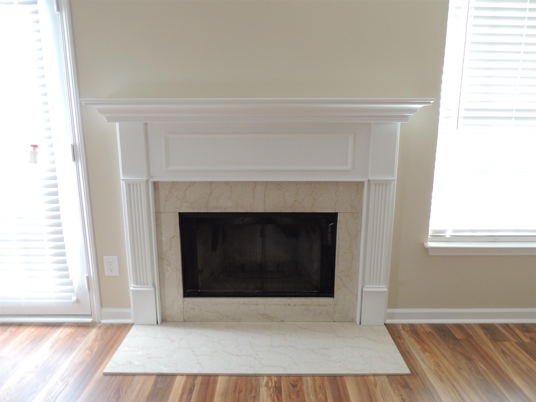 3504 Flora Drive Spring Hill, TN 37174 - Photo 10 of 17 a living room with a fireplace and a table