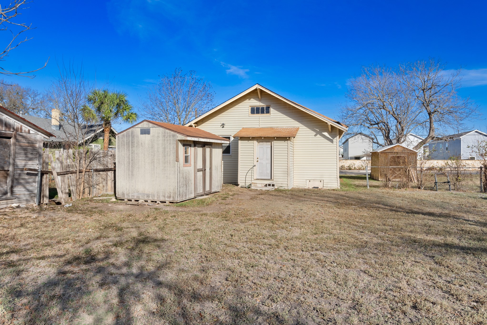 917 Trinity Street Lockhart, TX 78644 - Photo 12 of 13 a view of a house with a yard