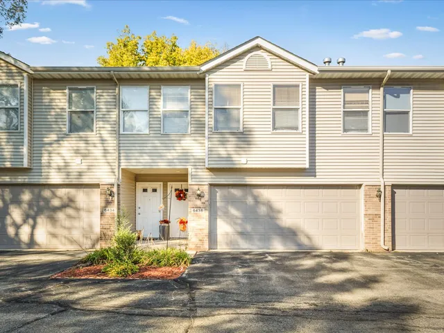 a view of a brick house with a window