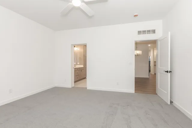 an empty room with a bathroom