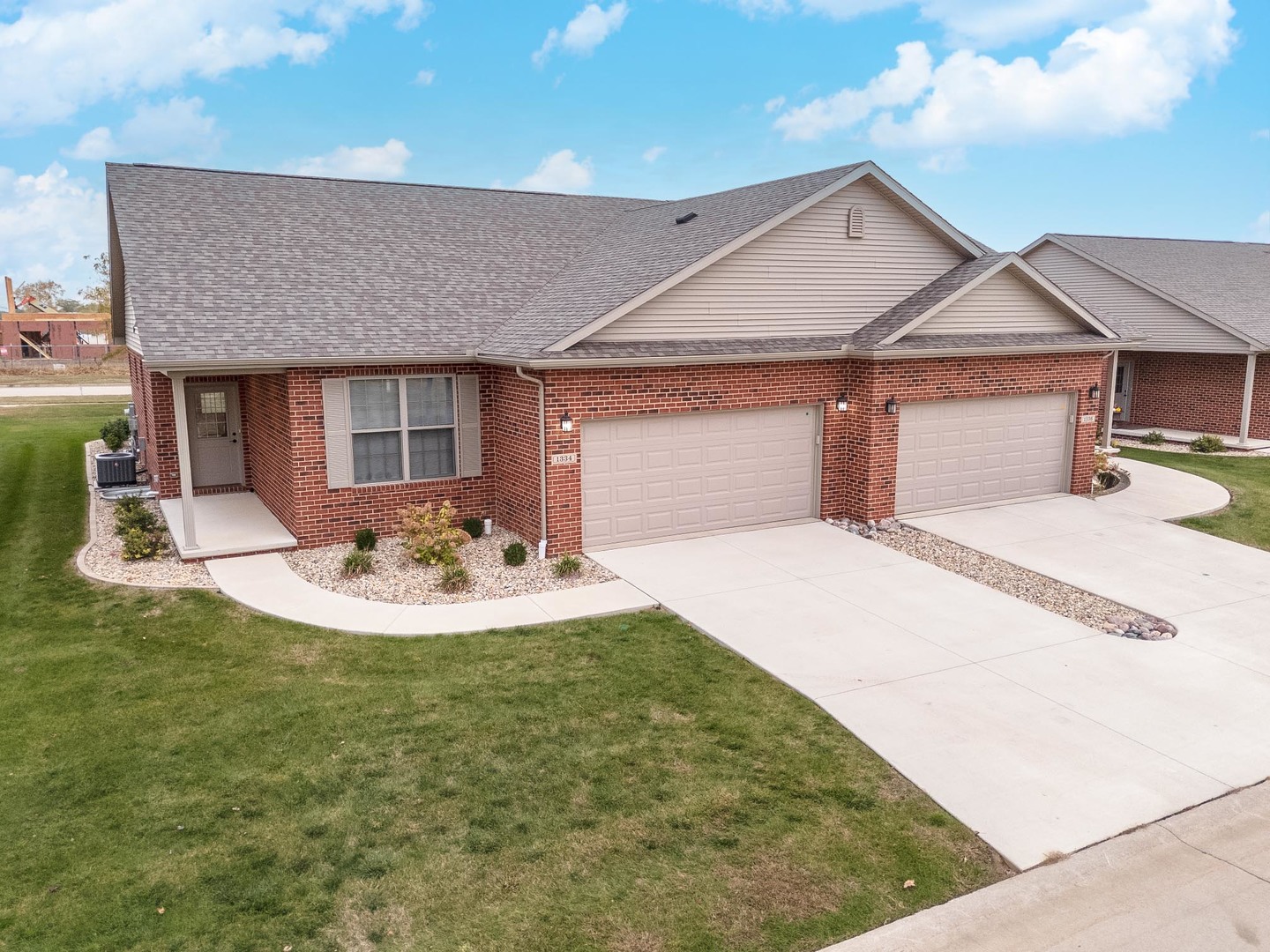 1334 Monterey Pine Drive, Unit 1334 Normal, IL 61761 - Photo 3 of 51 a view of a house with backyard and sitting area