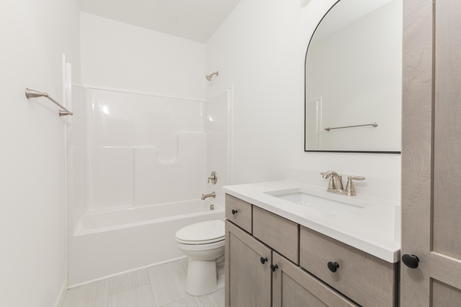 1334 Monterey Pine Drive, Unit 1334 Normal, IL 61761 - Photo 31 of 51 a bathroom with a sink a toilet and shower