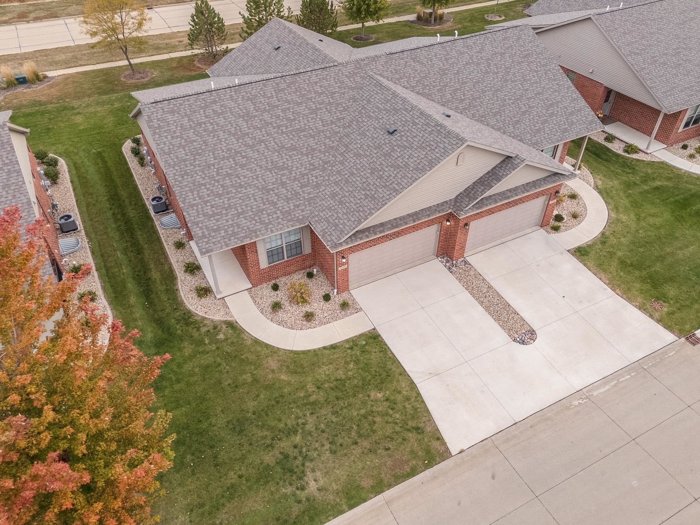 1334 Monterey Pine Drive, Unit 1334 Normal, IL 61761 - Photo 4 of 51 an aerial view of a house with garden space