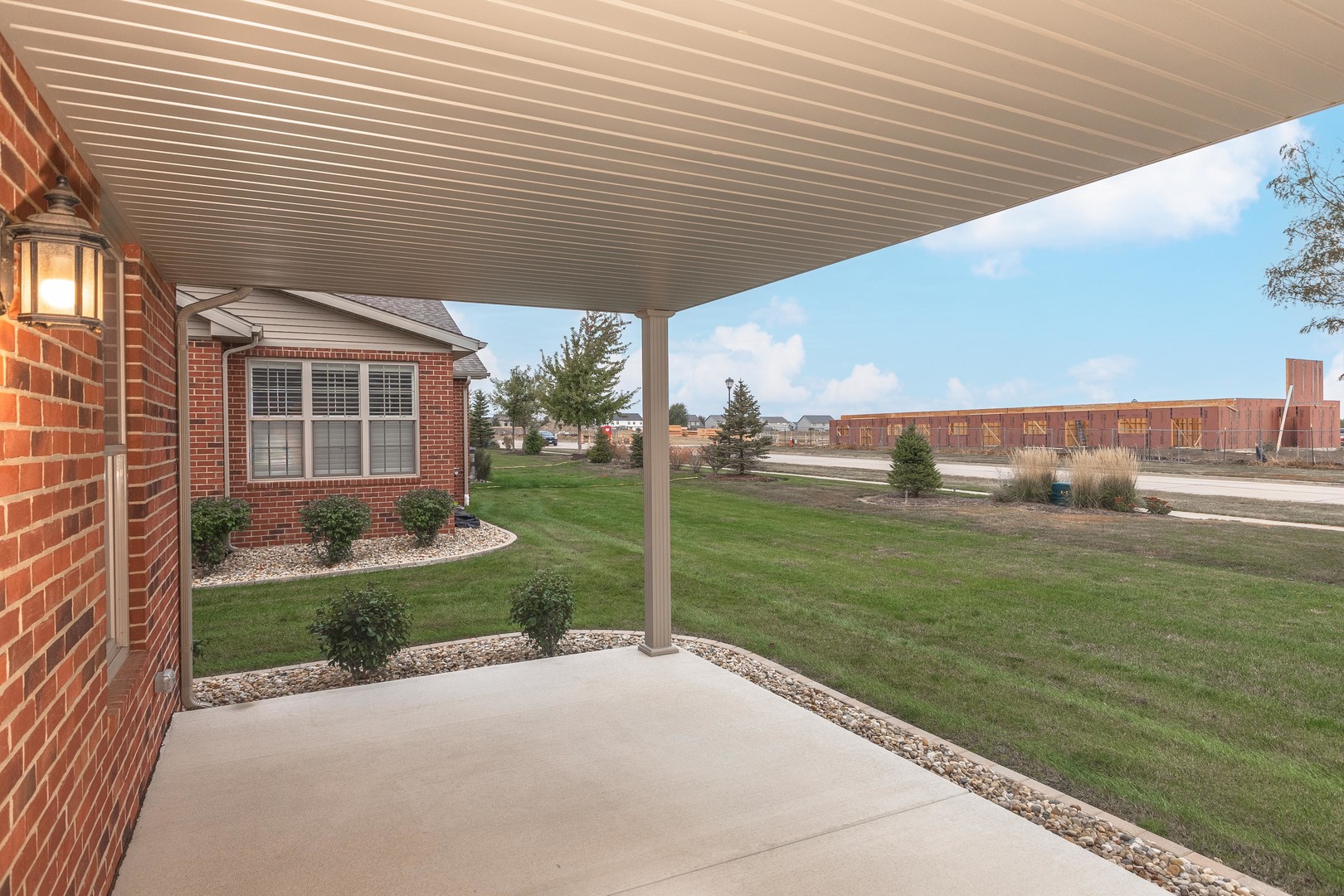 1334 Monterey Pine Drive, Unit 1334 Normal, IL 61761 - Photo 46 of 51 a view of a house with a yard