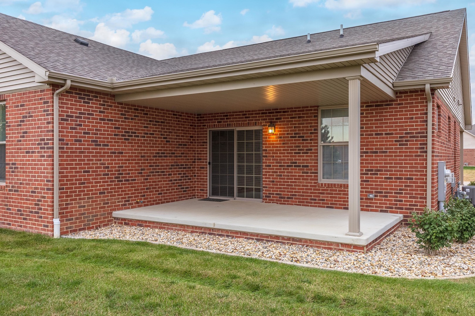 1334 Monterey Pine Drive, Unit 1334 Normal, IL 61761 - Photo 48 of 51 a view of a house with a backyard