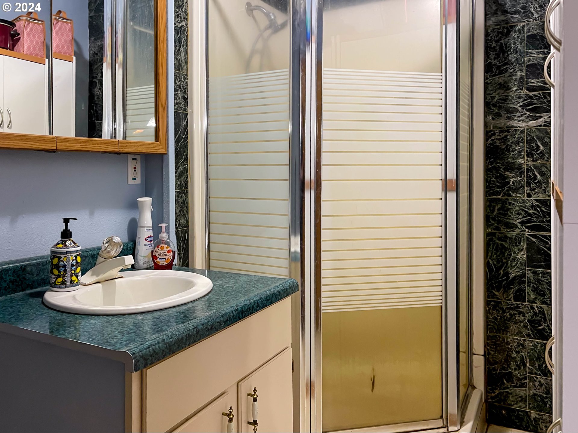 35067 Ede Road Lebanon, OR 97355 - Photo 25 of 40 a bathroom with a sink and a mirror