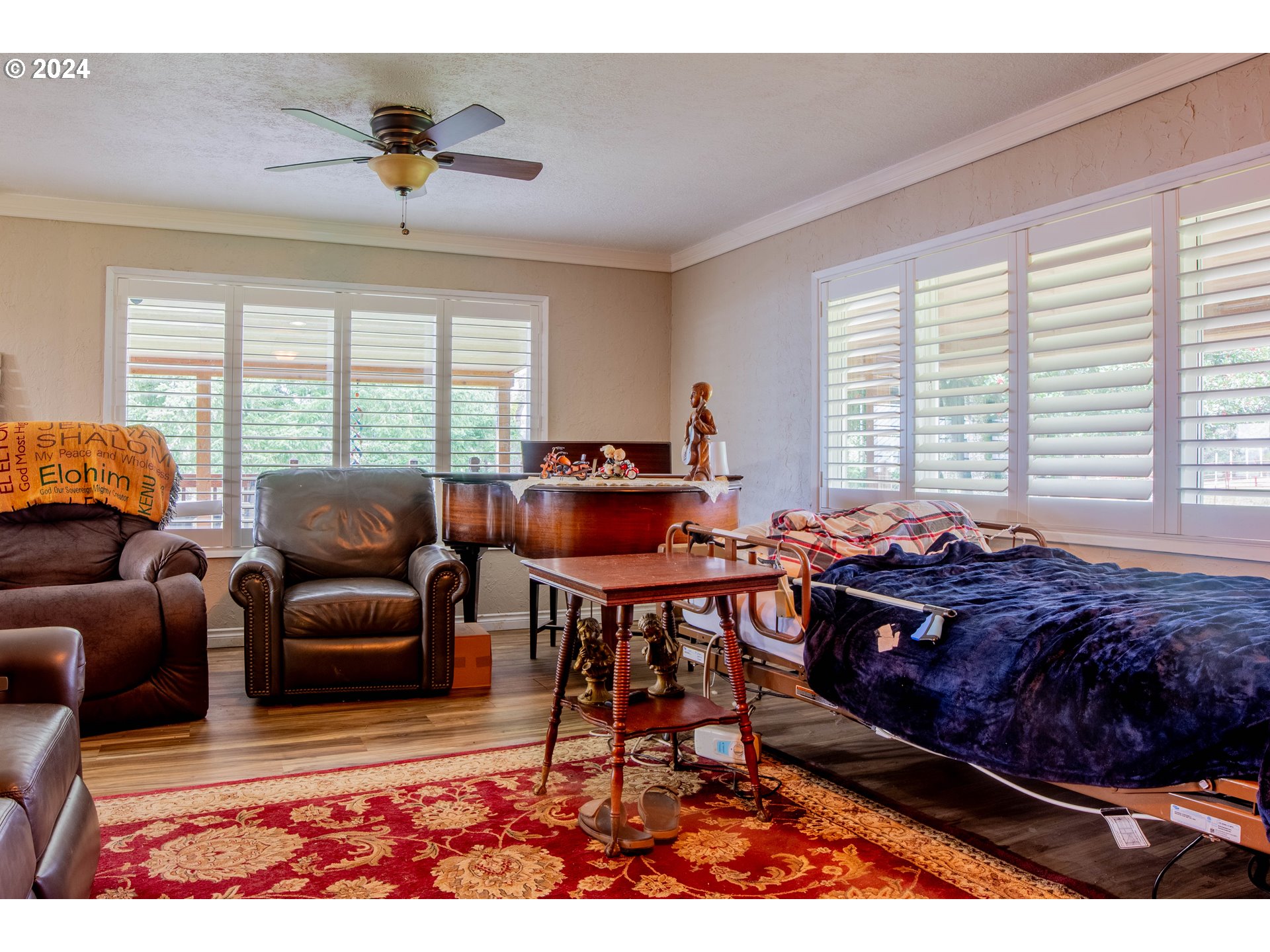 35067 Ede Road Lebanon, OR 97355 - Photo 5 of 40 a living room with furniture a rug and a large window