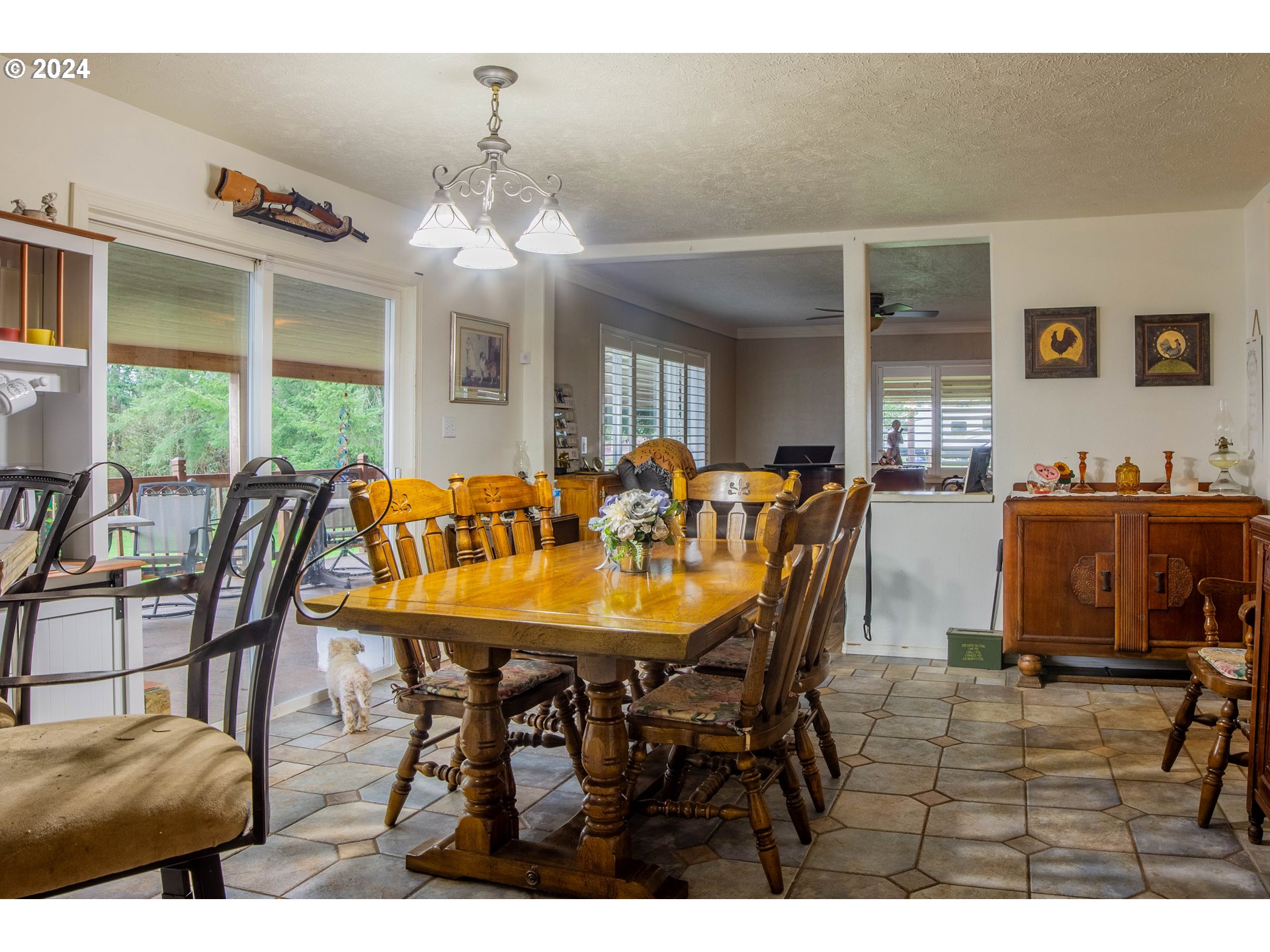 35067 Ede Road Lebanon, OR 97355 - Photo 6 of 40 a view of a dining room with furniture and chandelier
