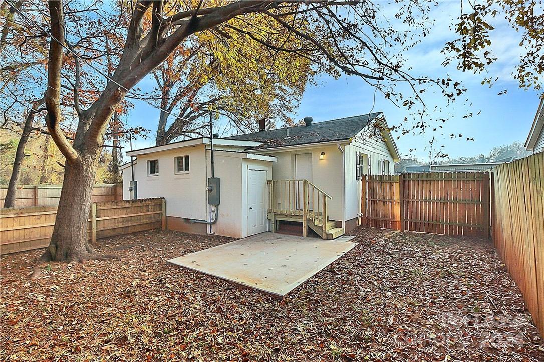 217 Sanders Street, Unit A Fort Mill, SC 29715 - Photo 14 of 16 a view of a backyard of a house