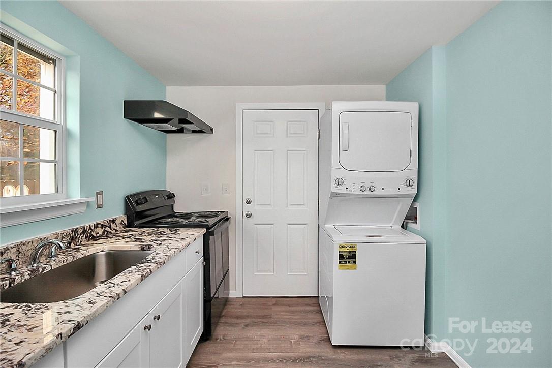 217 Sanders Street, Unit A Fort Mill, SC 29715 - Photo 10 of 16 a kitchen with a stove and a sink