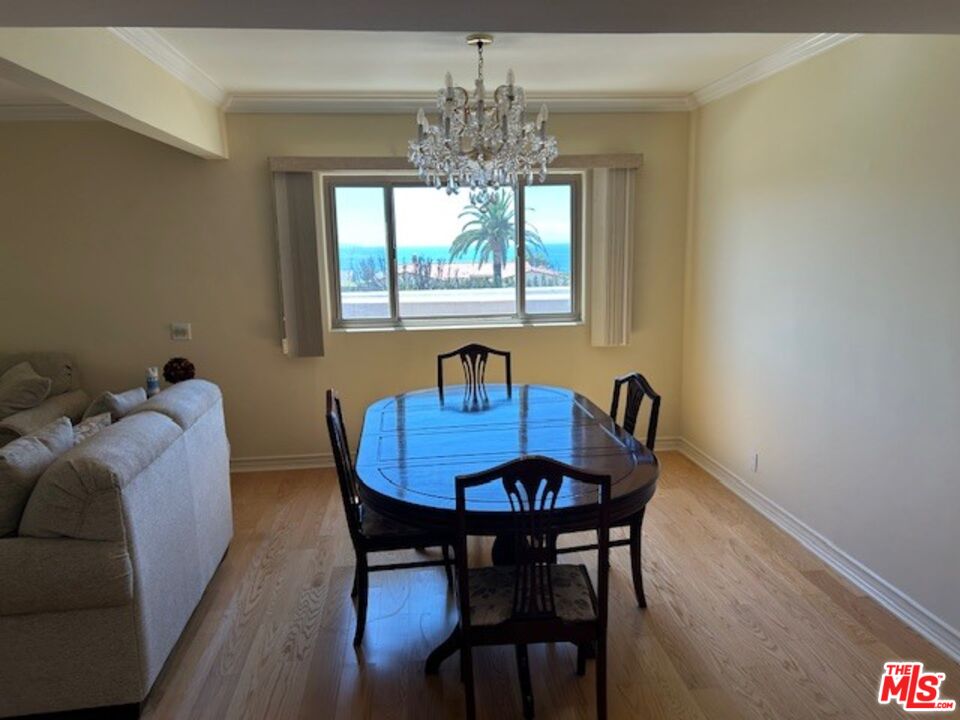 3908 Castlerock Road Malibu, CA 90265 - Photo 9 of 17 a view of a dining room with furniture window and outside view