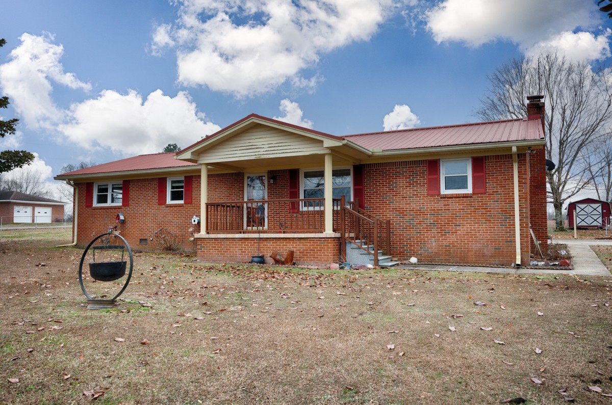 14052 Elk River Mills Road Athens, AL 35614 - Photo 27 of 43 a front view of a house with a yard