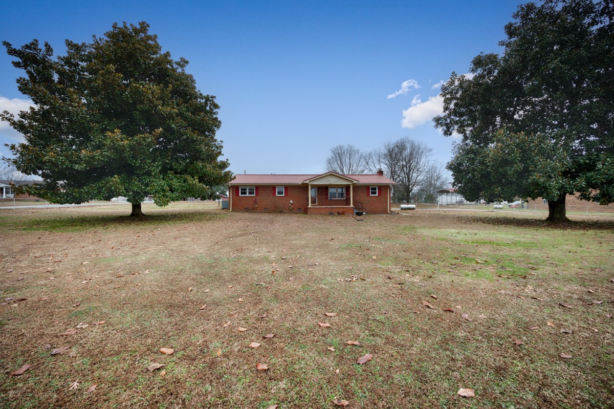 14052 Elk River Mills Road Athens, AL 35614 - Photo 28 of 43 a view of a house with a yard