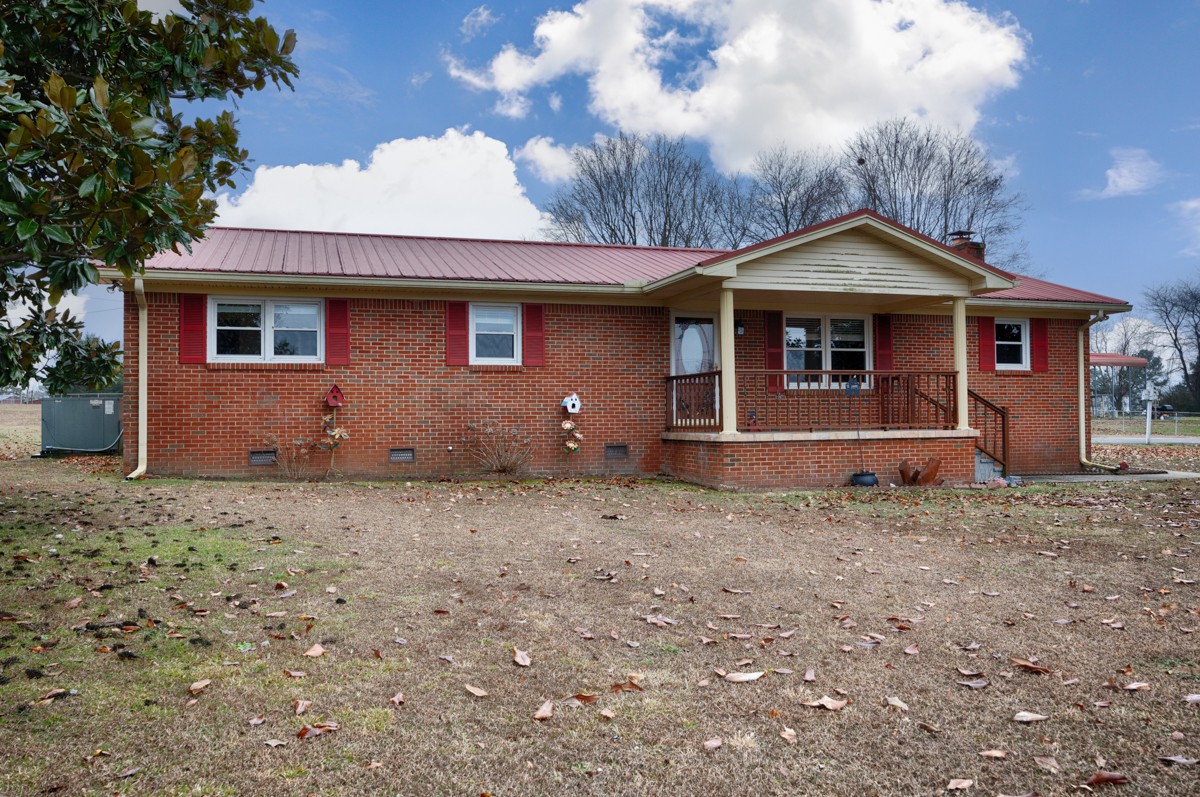 14052 Elk River Mills Road Athens, AL 35614 - Photo 29 of 43 a front view of a house with a yard