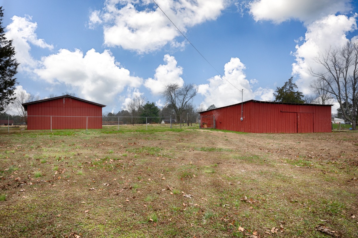 14052 Elk River Mills Road Athens, AL 35614 - Photo 34 of 43 a house with yard in front of it