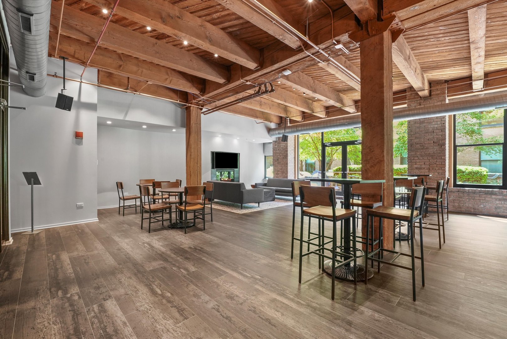 1040 West Adams Street, Unit 213 Chicago, IL 60607 - Photo 25 of 30 a view of a dining room with furniture window and outside view