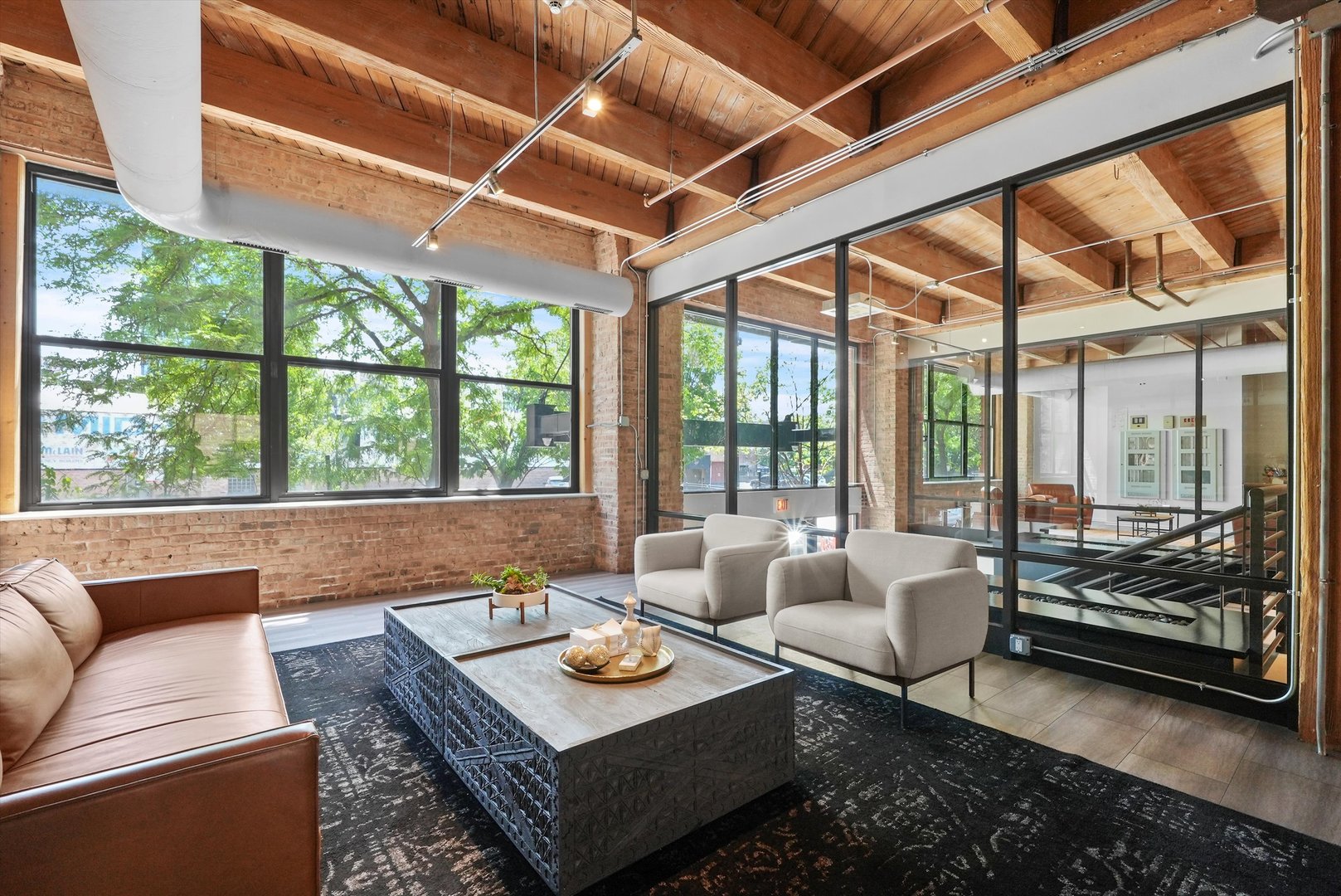1040 West Adams Street, Unit 213 Chicago, IL 60607 - Photo 27 of 30 a living room with furniture and a large window