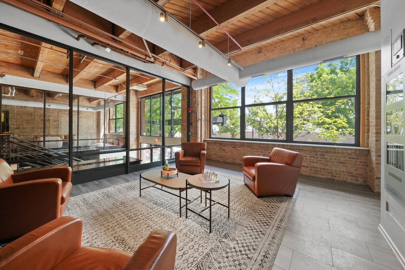 1040 West Adams Street, Unit 213 Chicago, IL 60607 - Photo 28 of 30 a living room with furniture and a window