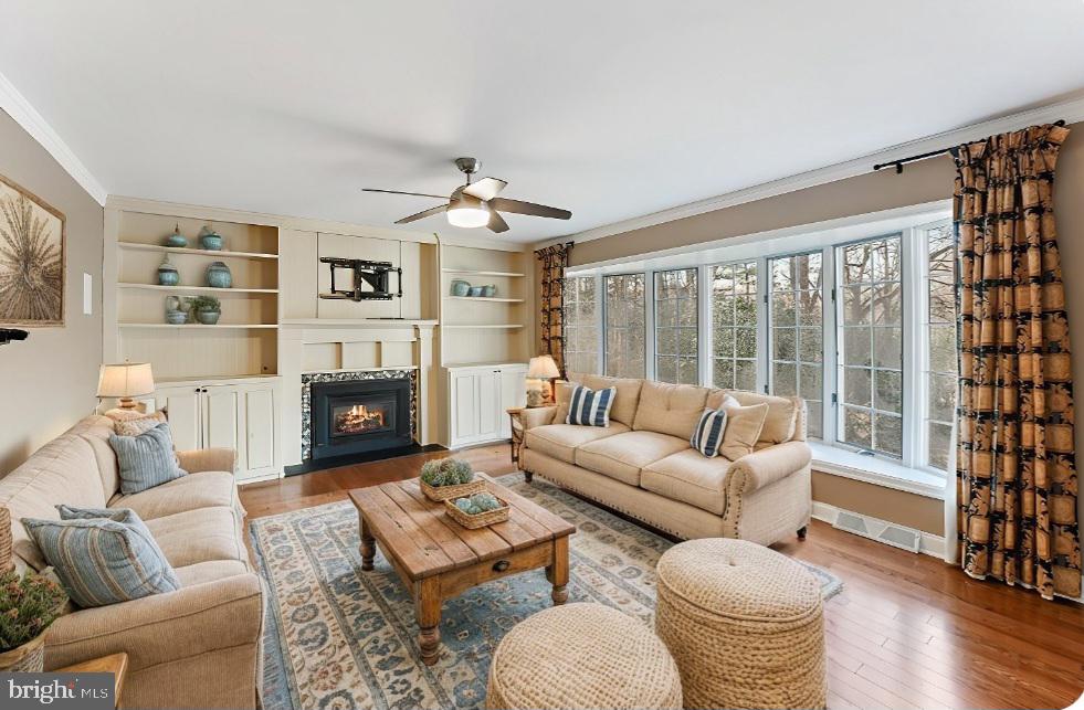 97 Quail Run Kennett Square, PA 19348 - Photo 13 of 34 a living room with furniture large window and a fireplace