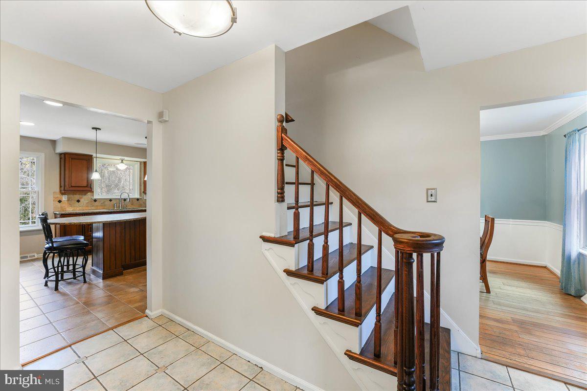 97 Quail Run Kennett Square, PA 19348 - Photo 20 of 34 a view of entryway and hall with wooden floor