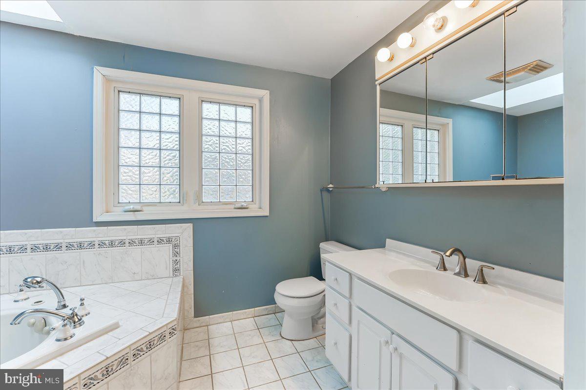 97 Quail Run Kennett Square, PA 19348 - Photo 25 of 34 a bathroom with a sink and a toilet