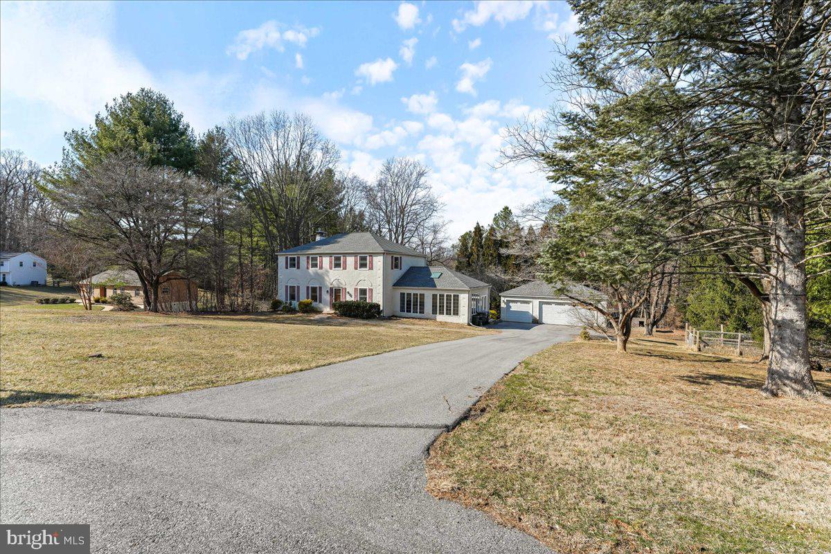 97 Quail Run Kennett Square, PA 19348 - Photo 34 of 34 a street view with large trees
