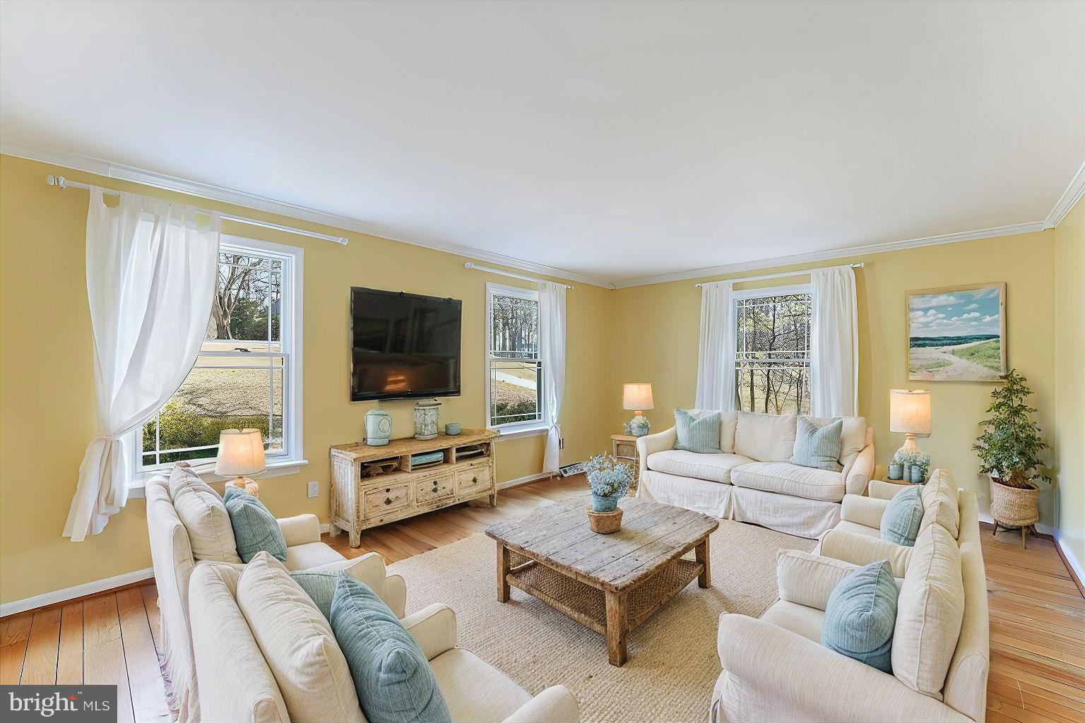 97 Quail Run Kennett Square, PA 19348 - Photo 10 of 34 a living room with furniture and a flat screen tv