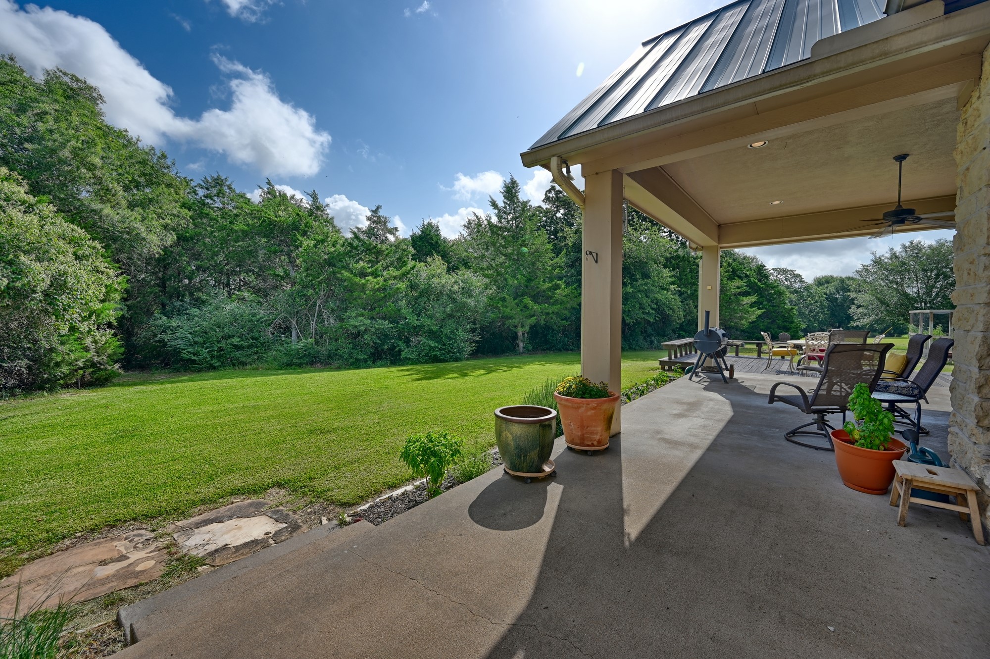 1205 Pecan Glen Road Brenham, TX 77833 - Photo 5 of 40 With a large backyard and woods with trails and more!