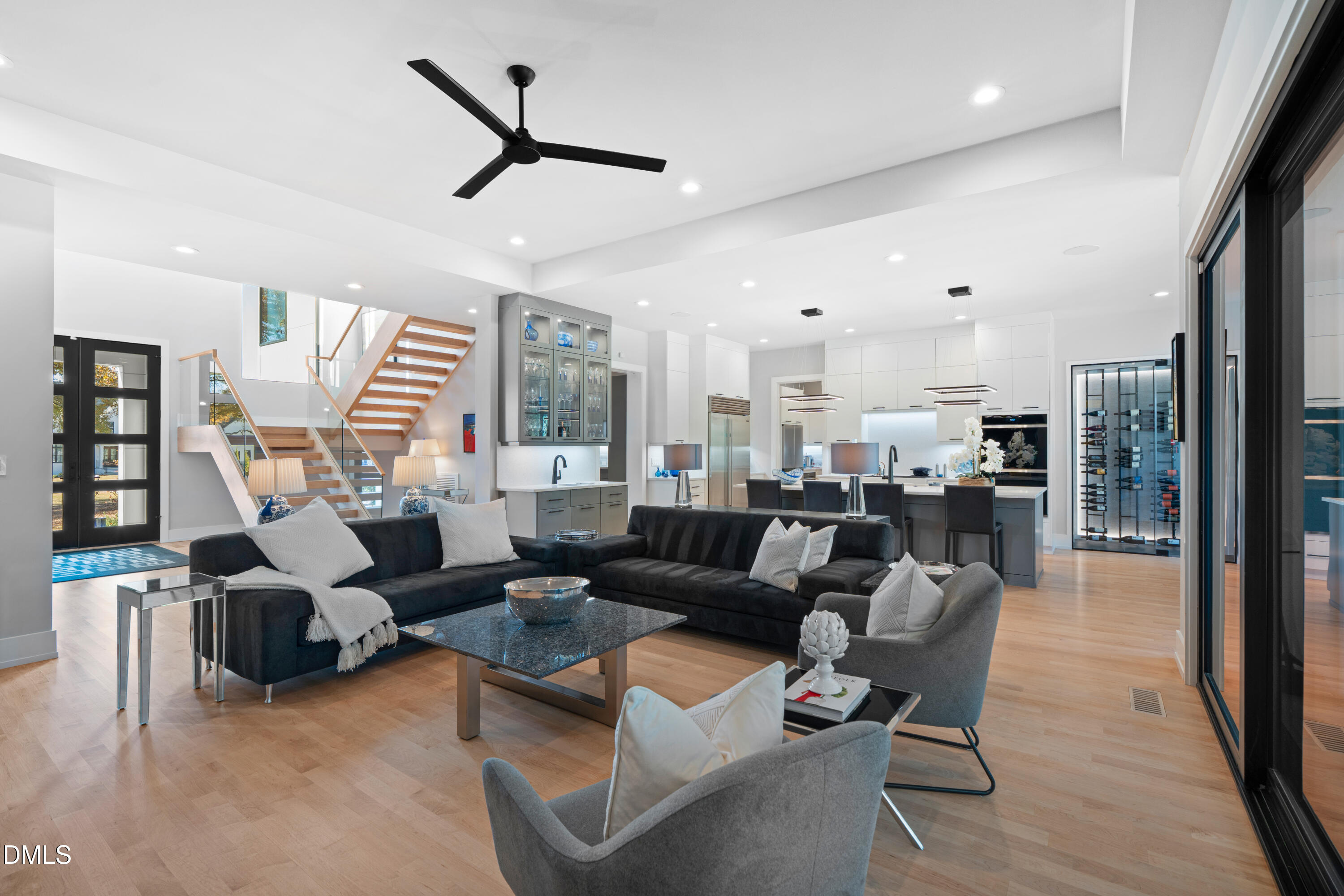 132 Edward Booth Lane Durham, NC 27713 - Photo 11 of 75 a living room with furniture or kitchen view and a wooden floor