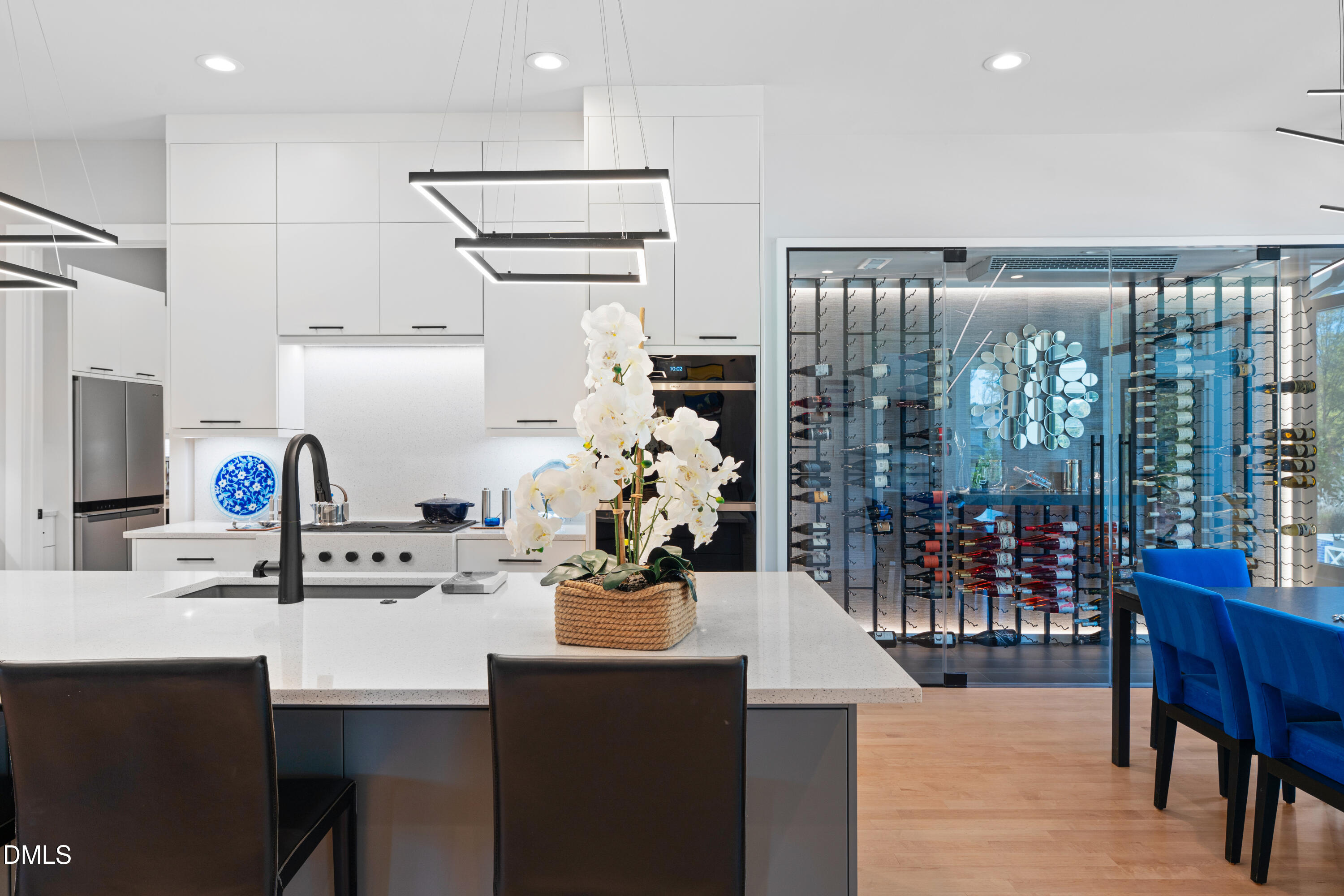 132 Edward Booth Lane Durham, NC 27713 - Photo 13 of 75 a kitchen with stainless steel appliances kitchen island granite countertop a sink and cabinets