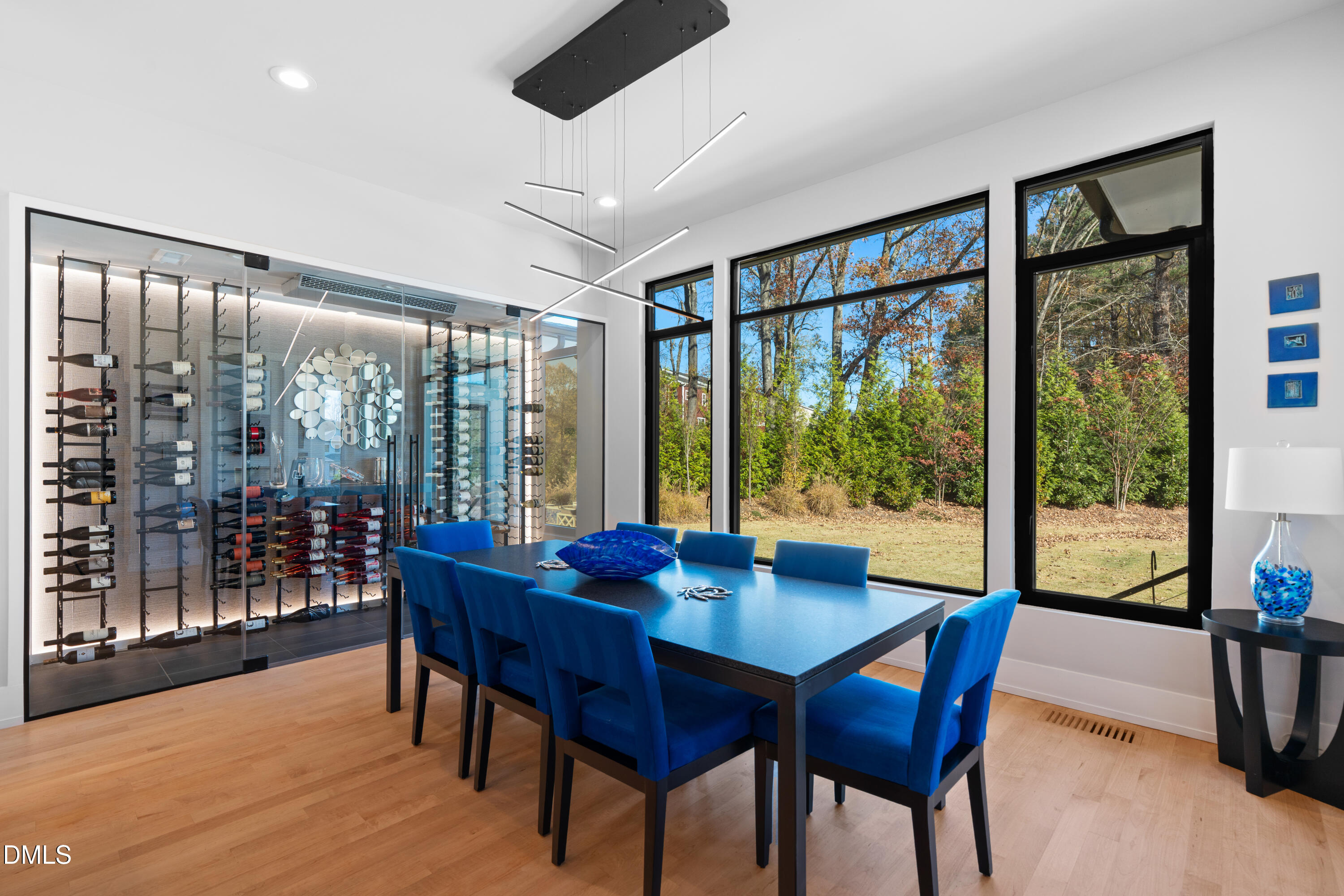 132 Edward Booth Lane Durham, NC 27713 - Photo 18 of 75 a view of a dining room with furniture window and wooden floor
