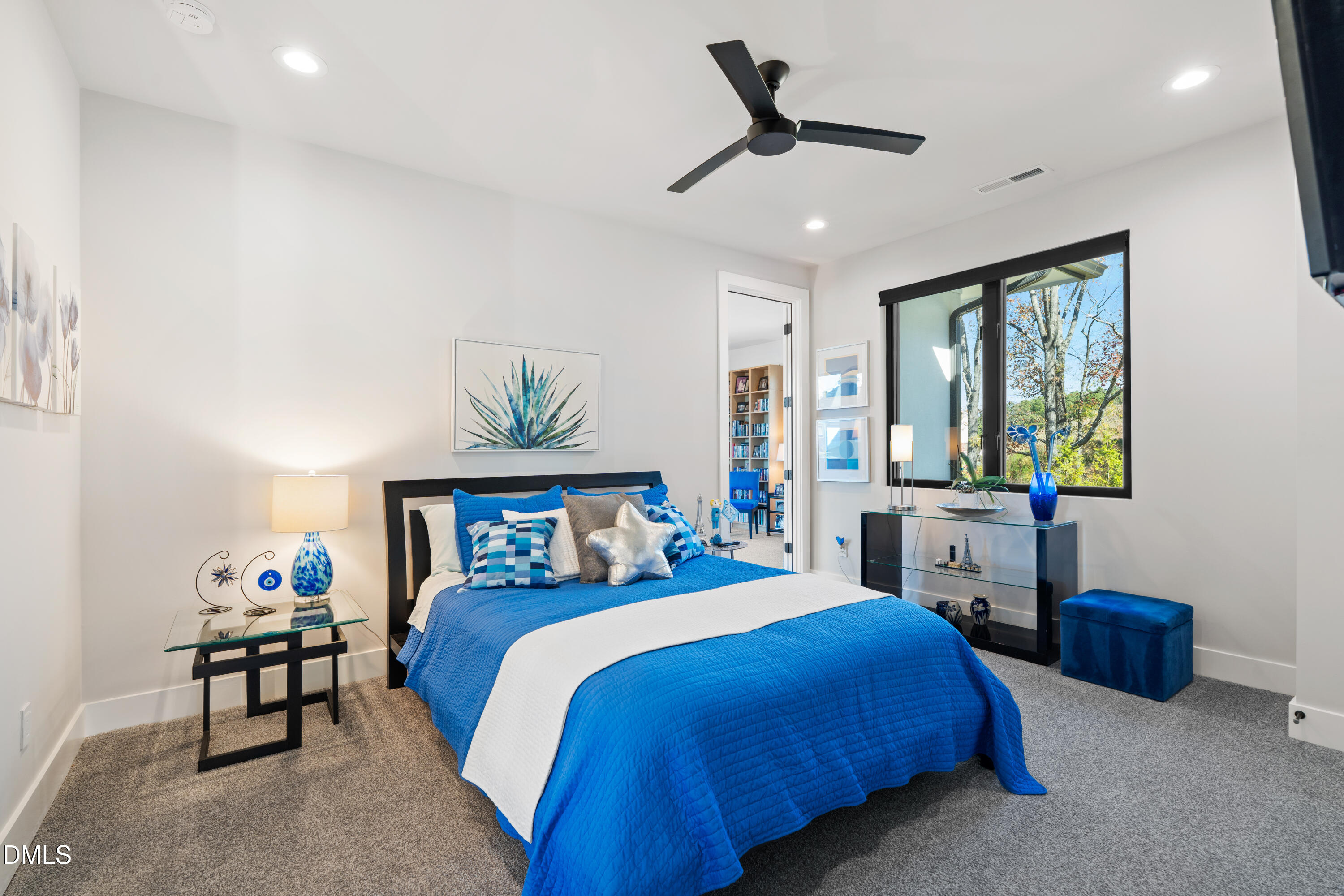 132 Edward Booth Lane Durham, NC 27713 - Photo 41 of 75 a bedroom with a bed and a table