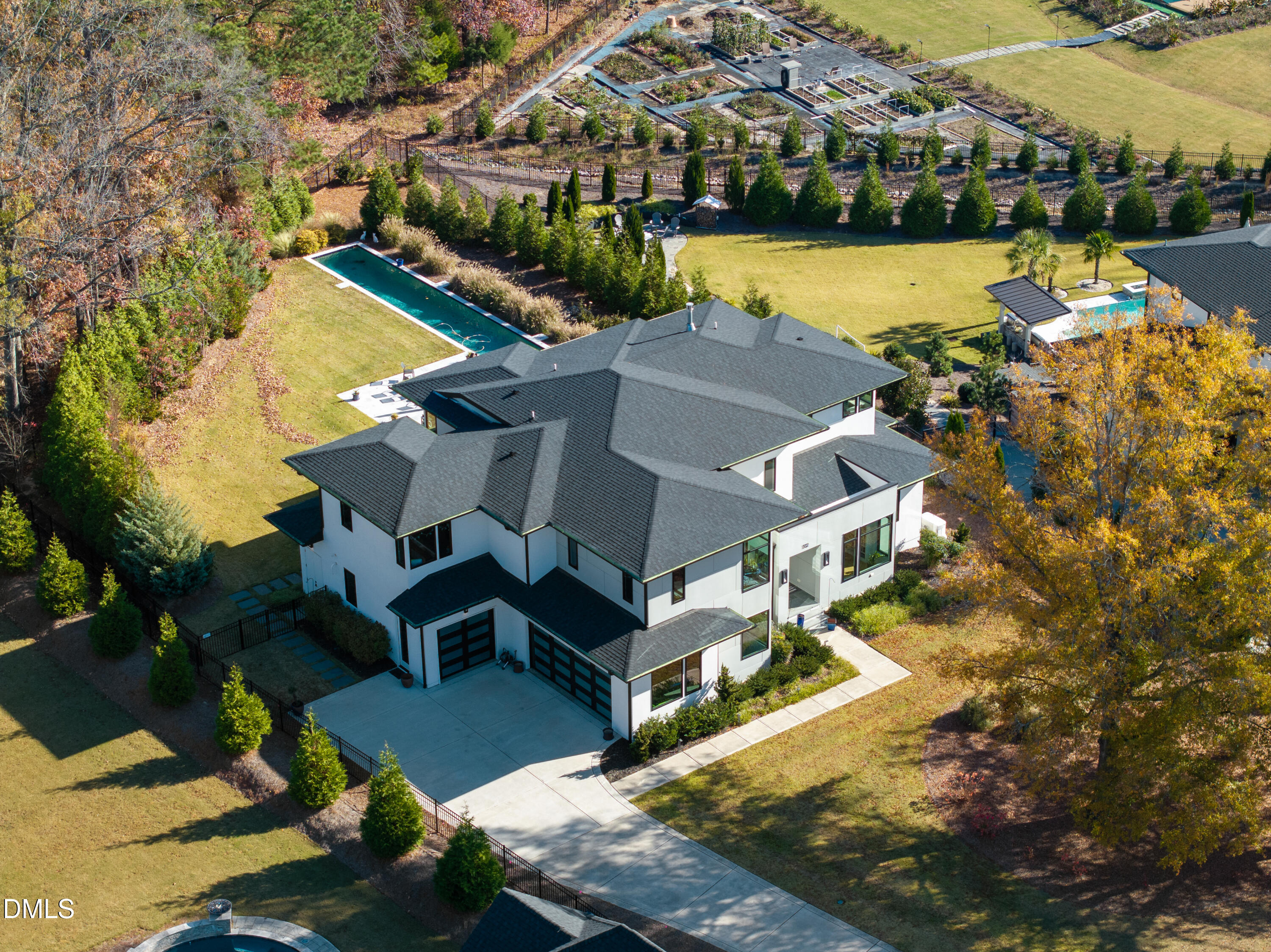 132 Edward Booth Lane Durham, NC 27713 - Photo 65 of 75 an aerial view of a house with swimming pool and outdoor seating