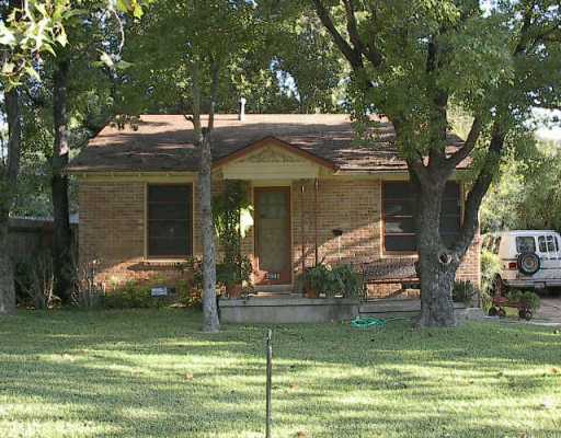 2802 Windsor Road Austin, TX 78703 - Photo 1 of 1 a view of a house with backyard and sitting area