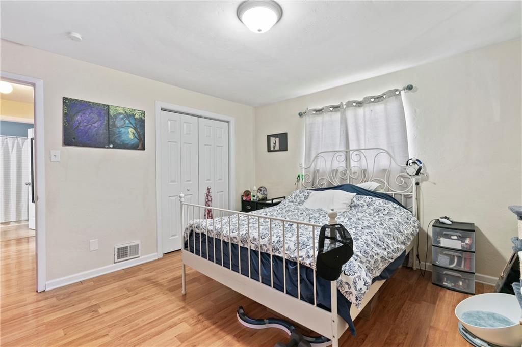 1807 Pine Hollow Road McKees Rocks, PA 15136 - Photo 15 of 47 a bedroom with a bed and a window