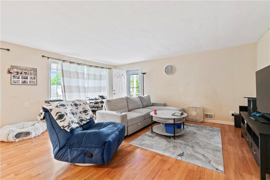 1807 Pine Hollow Road McKees Rocks, PA 15136 - Photo 21 of 47 a living room with furniture and a flat screen tv