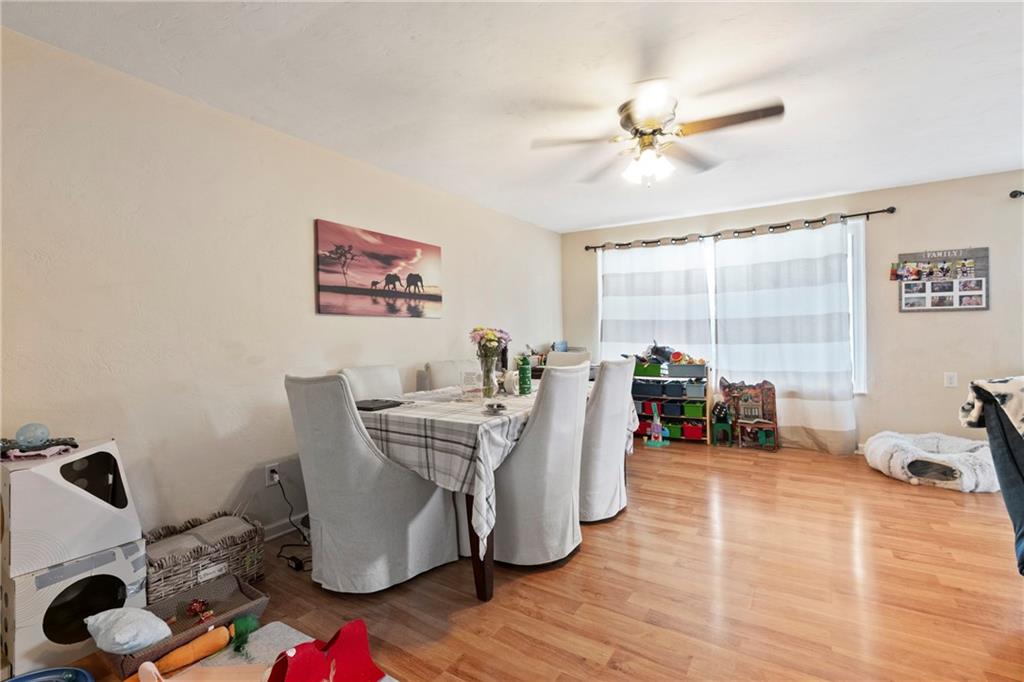 1807 Pine Hollow Road McKees Rocks, PA 15136 - Photo 22 of 47 a view of a dining room with furniture window and outside view