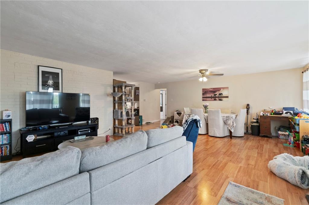 1807 Pine Hollow Road McKees Rocks, PA 15136 - Photo 24 of 47 a living room with furniture and a flat screen tv