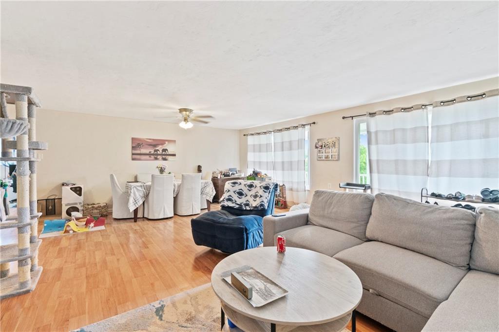 1807 Pine Hollow Road McKees Rocks, PA 15136 - Photo 25 of 47 a living room with furniture and a table