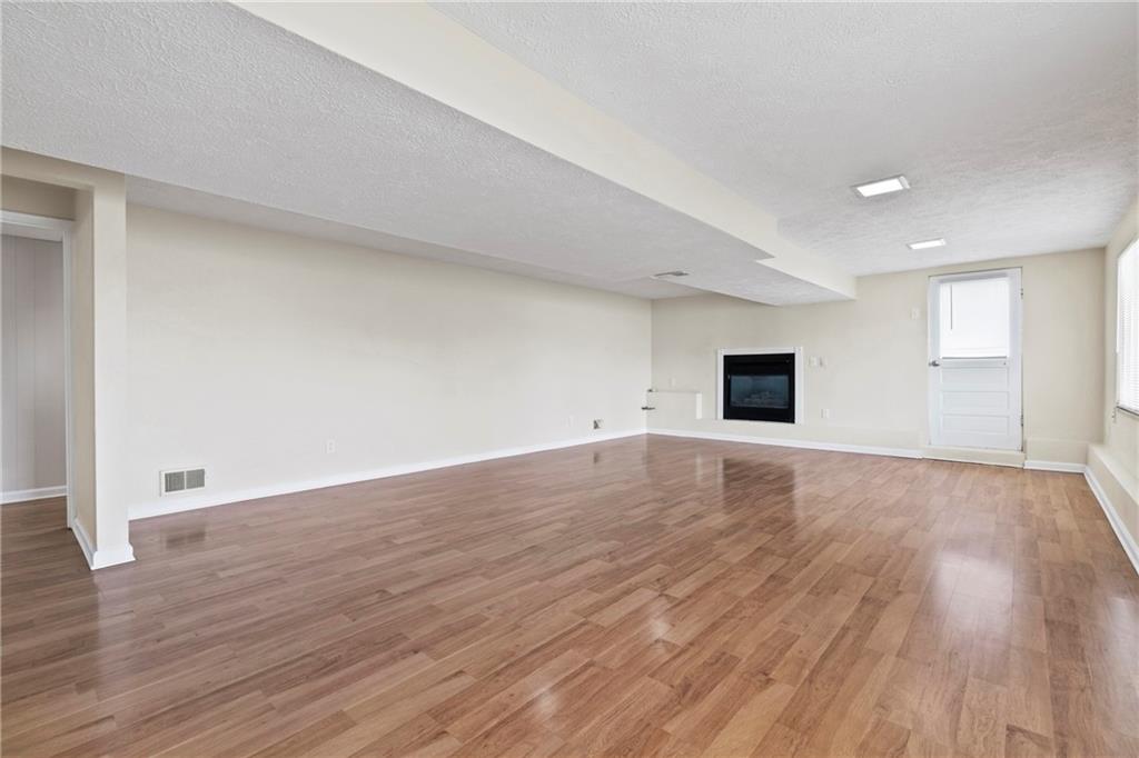 1807 Pine Hollow Road McKees Rocks, PA 15136 - Photo 32 of 47 a view of empty room with wooden floor