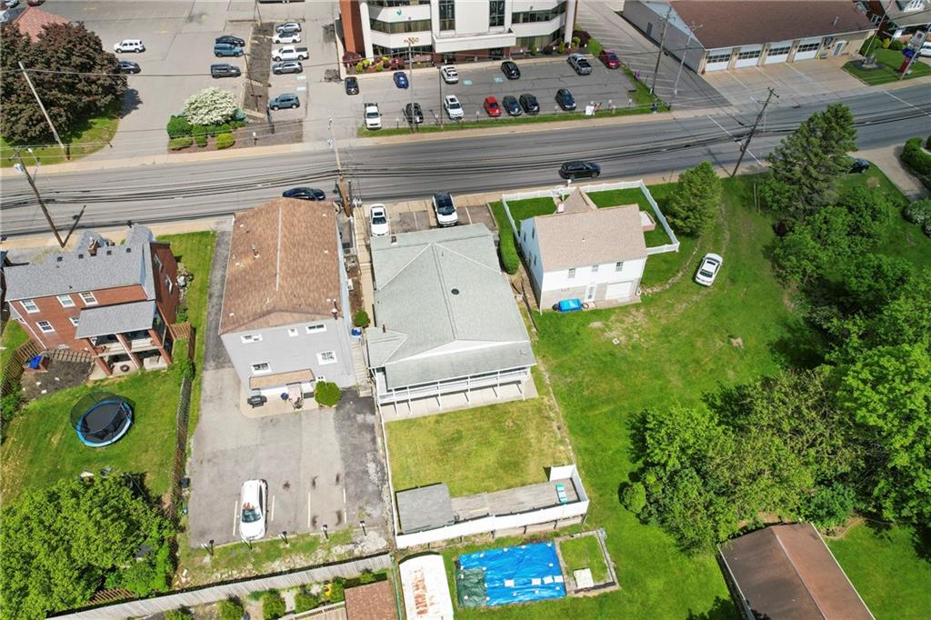1807 Pine Hollow Road McKees Rocks, PA 15136 - Photo 41 of 47 an aerial view of a house with a yard and large trees