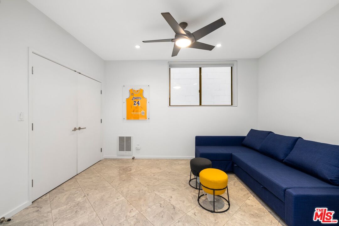 3007 Ocean Front Walk Venice, CA 90291 - Photo 12 of 33 a living room with furniture a air conditioner vent and a window