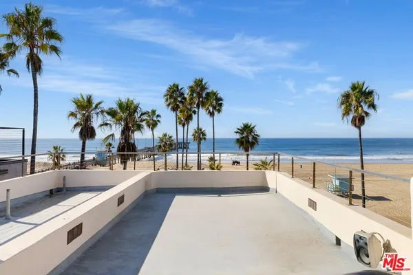 a view of a swimming pool with a lounge chair