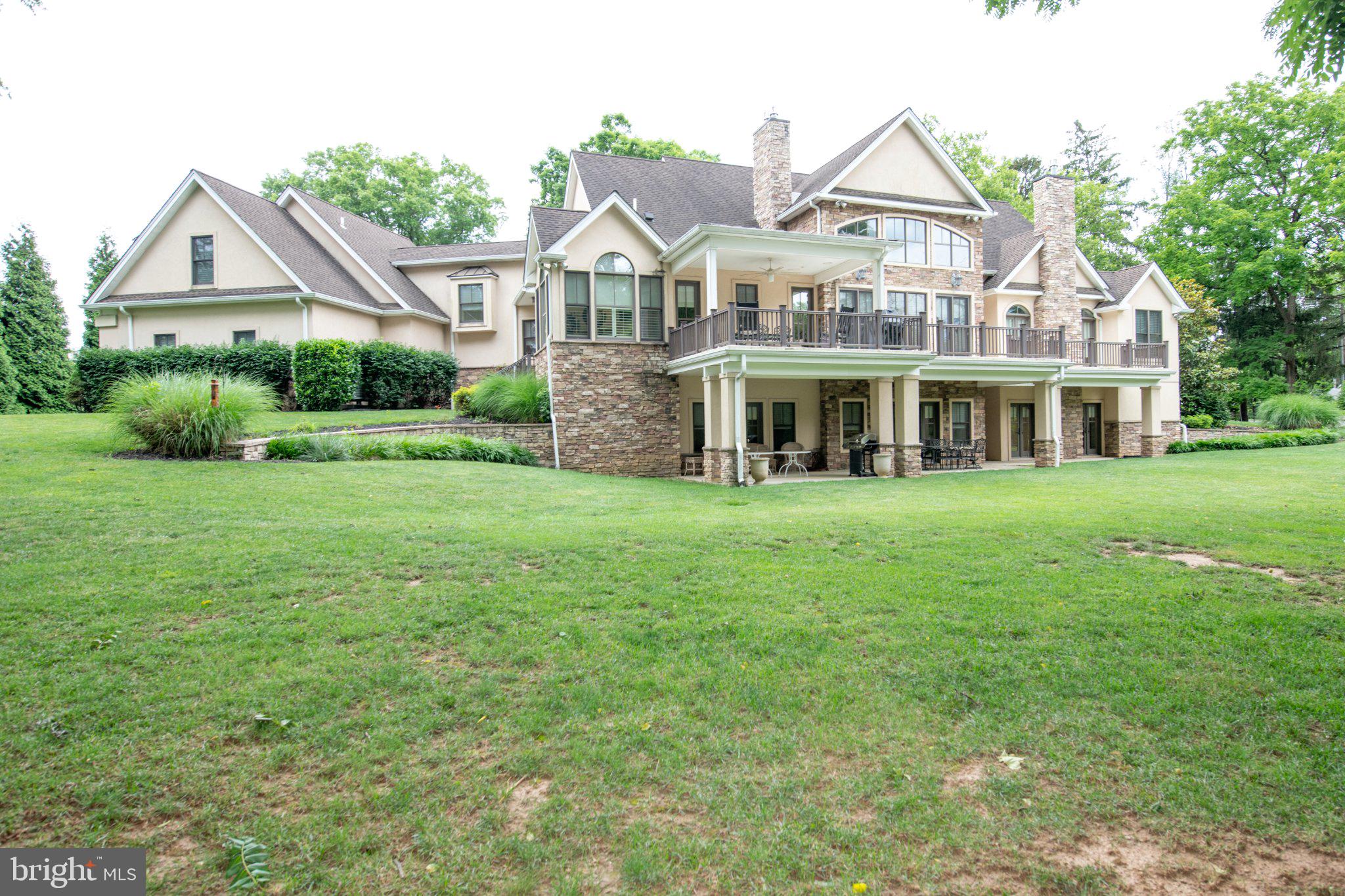 711 Moredon Road Jenkintown, PA 19046 - Photo 21 of 140 Elegant home with lush green surroundings.