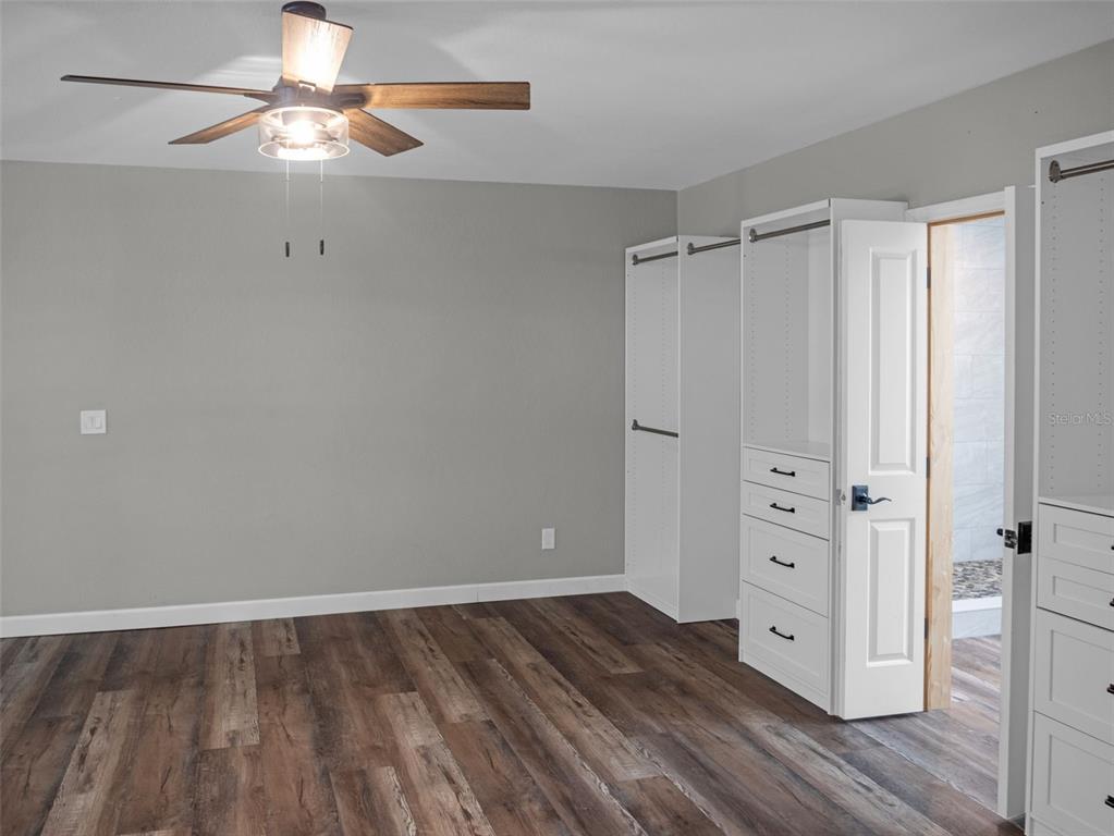 628 Bethel Street Keystone Heights, FL 32656 - Photo 14 of 49 wooden floor in an empty room