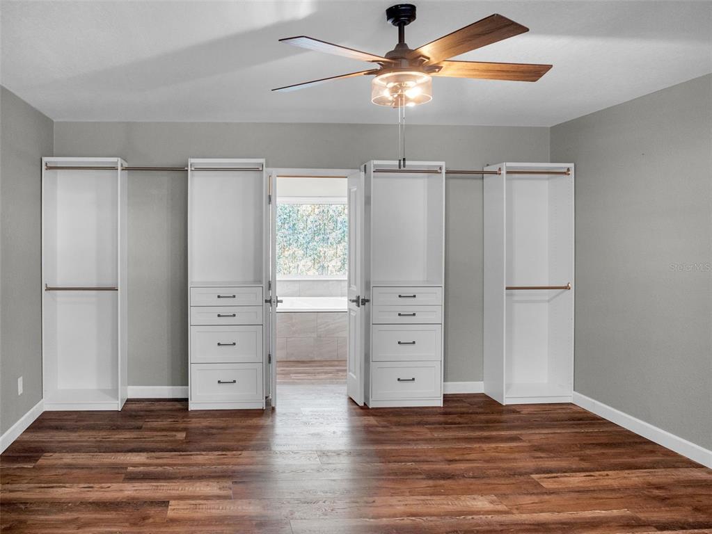 628 Bethel Street Keystone Heights, FL 32656 - Photo 17 of 49 wooden floor in an empty room
