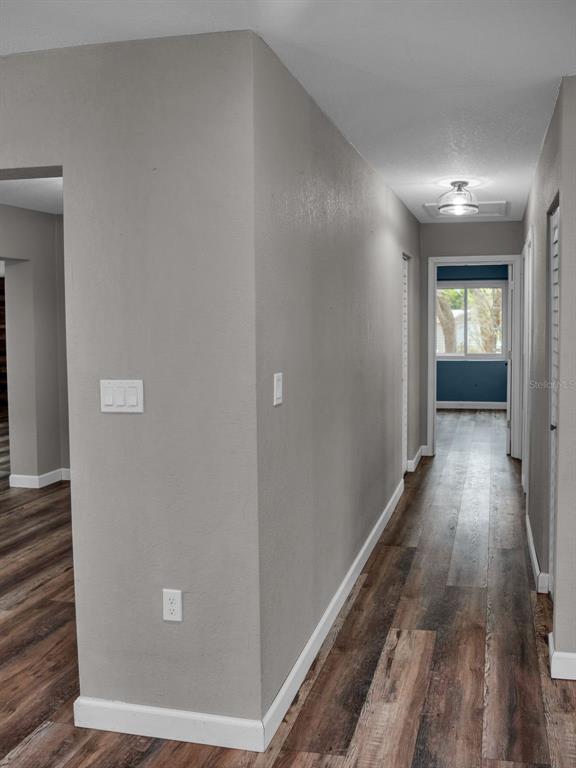 628 Bethel Street Keystone Heights, FL 32656 - Photo 22 of 49 a view of hallway with wooden floor