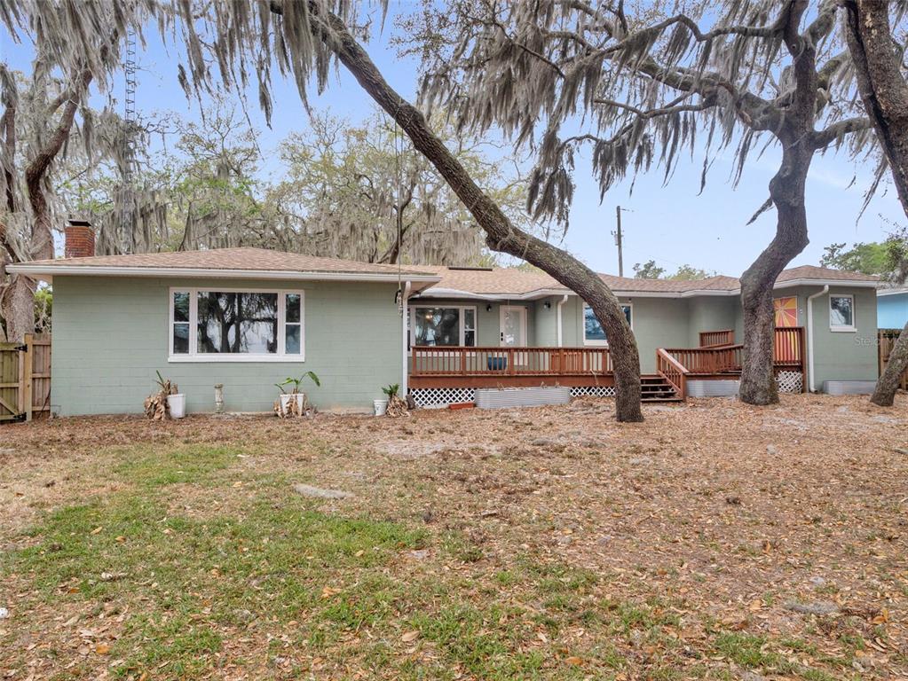 628 Bethel Street Keystone Heights, FL 32656 - Photo 38 of 49 a house with trees in the background