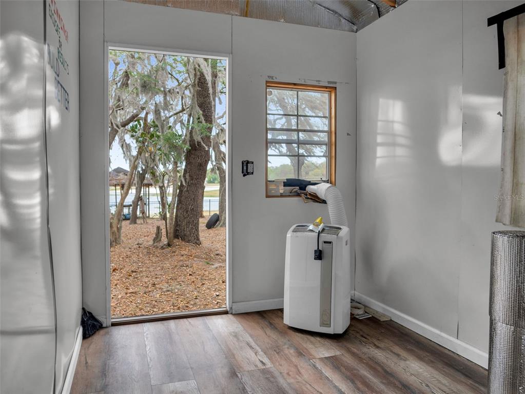 628 Bethel Street Keystone Heights, FL 32656 - Photo 43 of 49 a view of an entryway with wooden floor