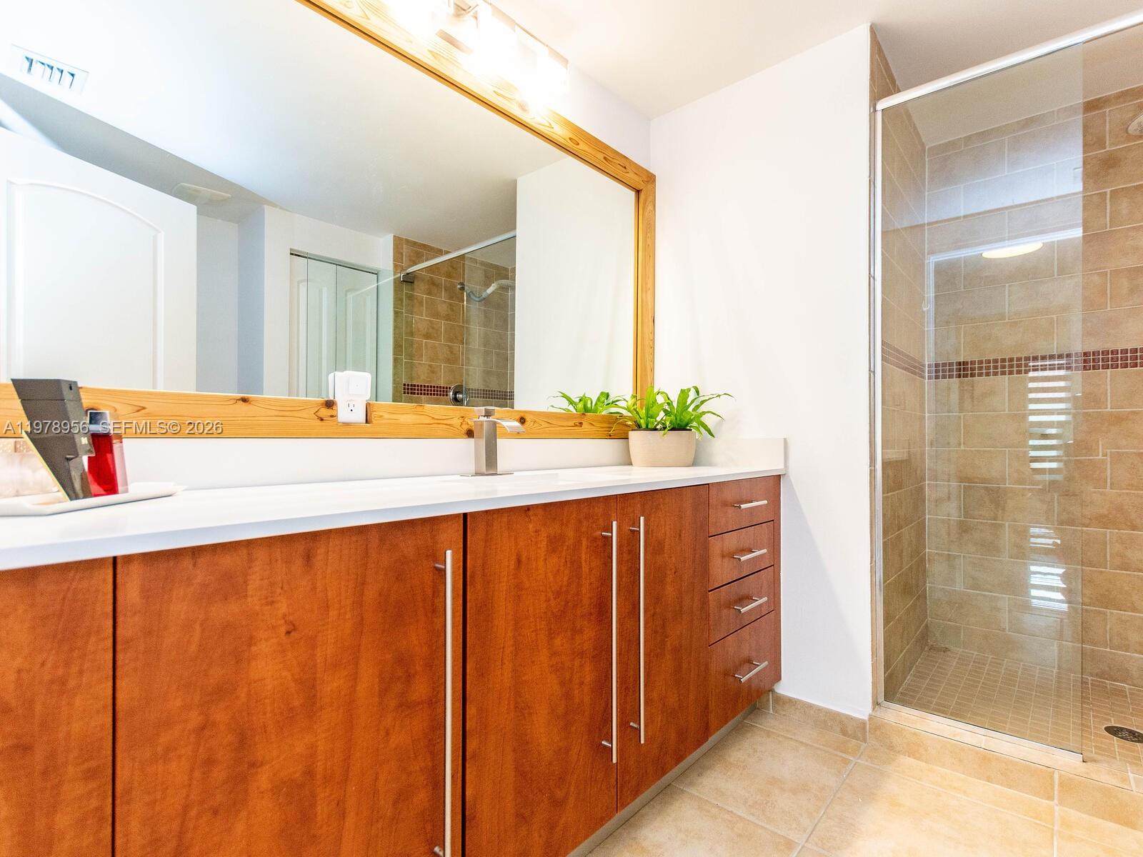 7350 Southwest 89th Street, Unit 719S Miami, FL 33156 - Photo 25 of 30 a view of a bathroom with tub and sink